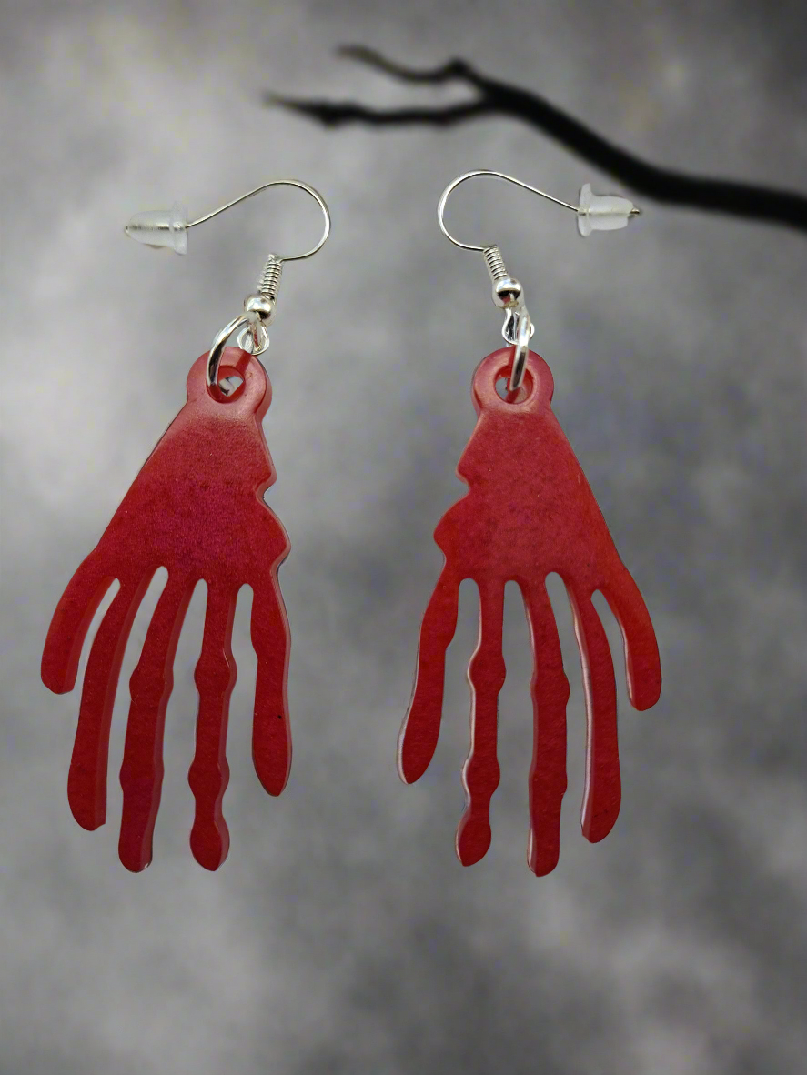 Pendientes espeluznantes con forma de mano de esqueleto de Halloween